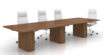 staged conference table with four rolling chairs